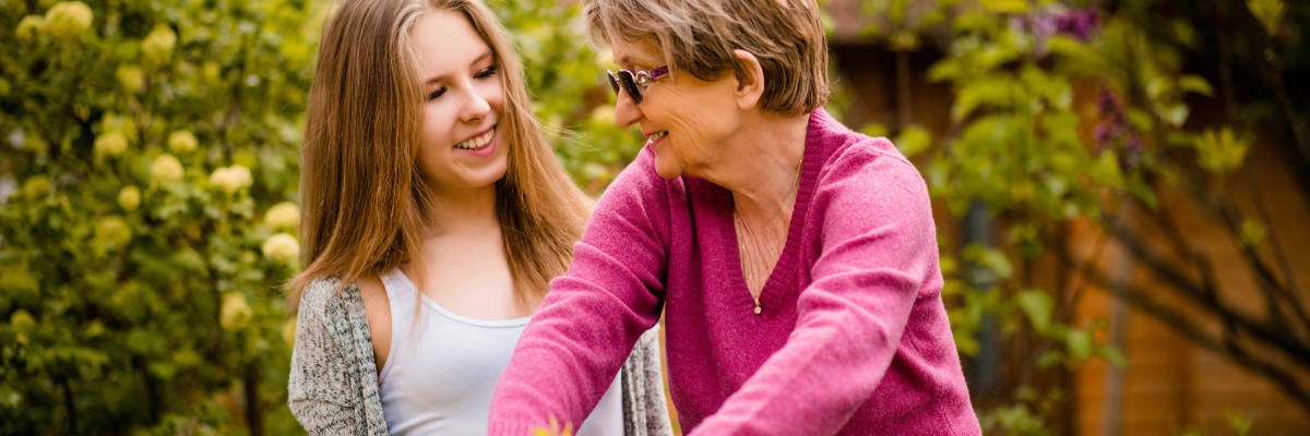 Grandmother teaches grandchild pruning Grandmother teaches grandchild pruning